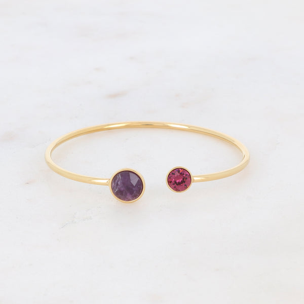 goudkleurige bangle met paars en bordeaux gekleurde stenen | stainless steel