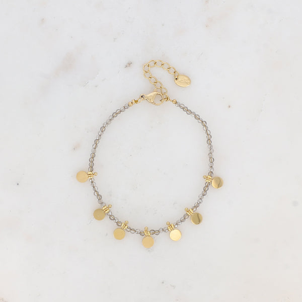 armbandje met zilverkleurige kralen en gladde goudkleurige muntjes | stainless steel
