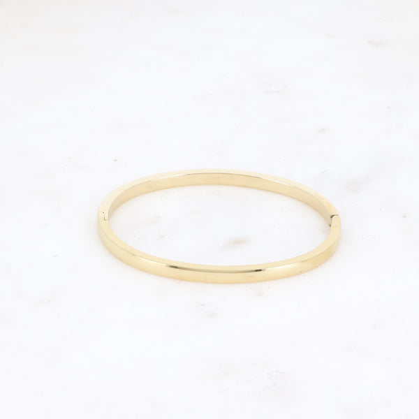 goudkleurige platte hoekige bangle van stainless steel