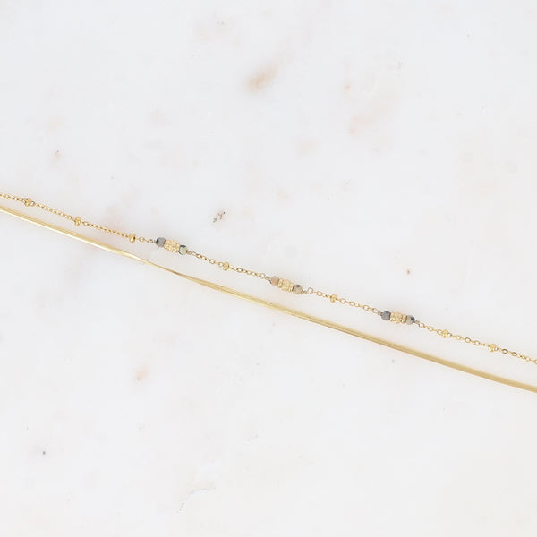 fijn goudkleurig 2 in 1 armbandje met fijne mineralen | stainless steel