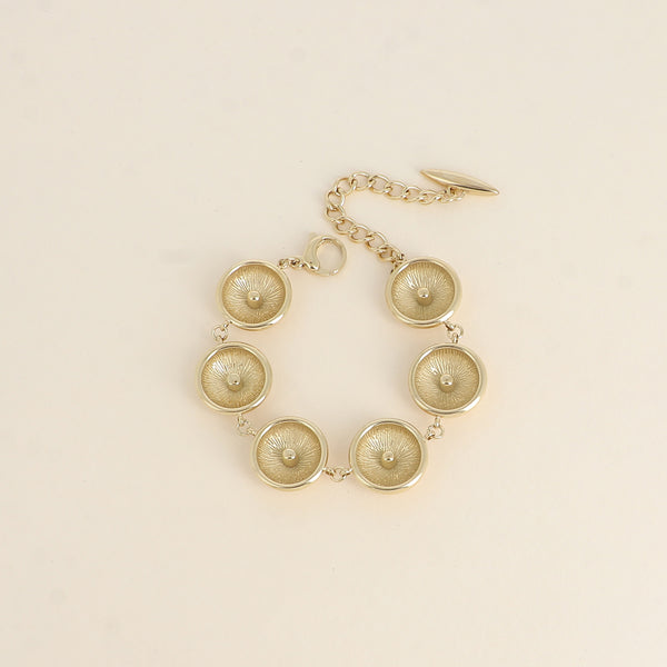 goudkleurige platte grote bolletjes armband van stainless steel