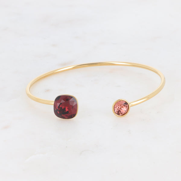 goudkleurige bangle met oud roze en bordeaux gekleurde stenen | stainless steel