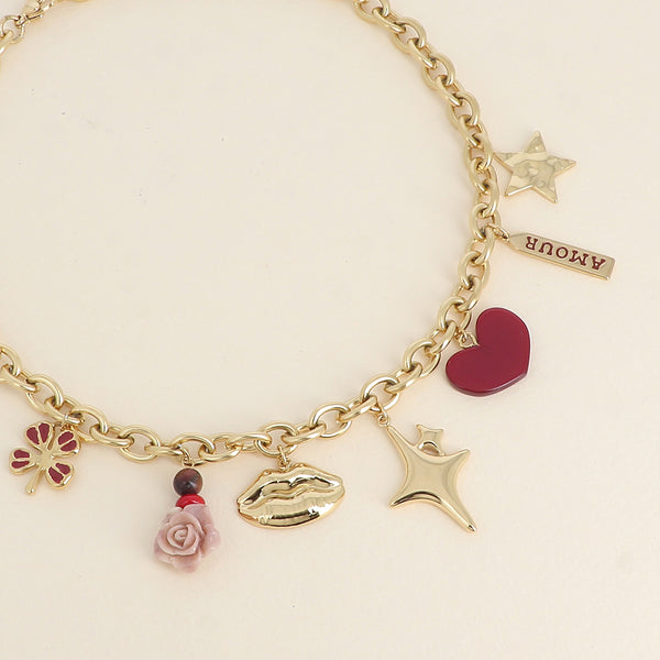 goudkleurig schakel collier met statement bedels 💗 | stainless steel