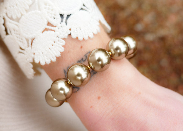 statement champagne parels met groot slot