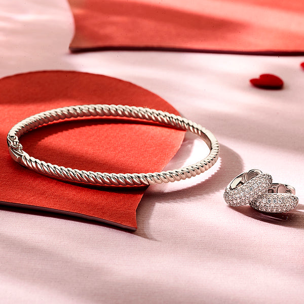 gevlochten bangle van echt zilver met bakslot en veiligheidsachtje