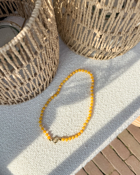 handgemaakt geel mineralen collier met groot slot