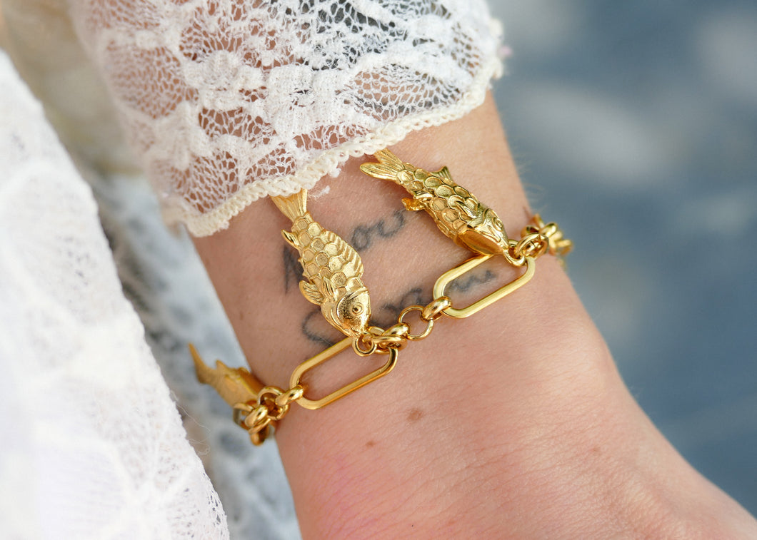 goudkleurige schakel armband met visjes 🐟 stainless steel