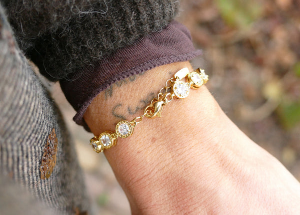 goudkleurige tennisbracelet met zirkonia stenen | stainless steel