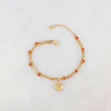 Afbeelding in Gallery-weergave laden, goudkleurig driedubbel armbandje met oranje kraaltjes | stainless steel
