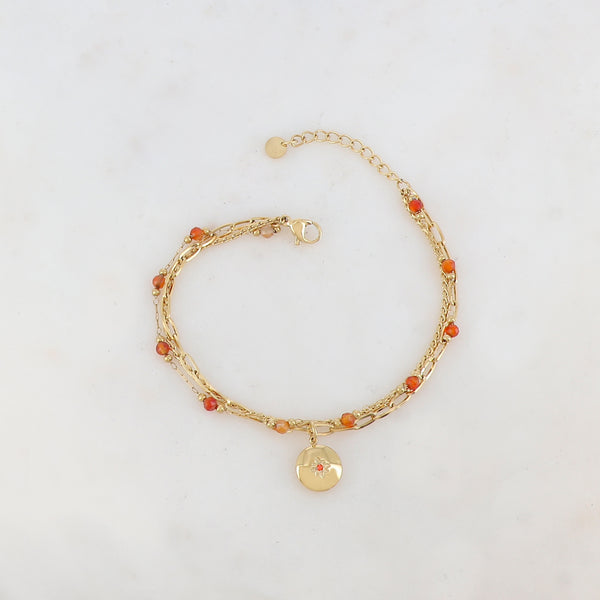goudkleurig driedubbel armbandje met oranje kraaltjes | stainless steel