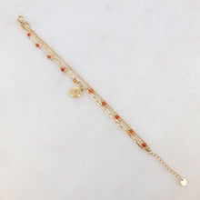 Afbeelding in Gallery-weergave laden, goudkleurig driedubbel armbandje met oranje kraaltjes | stainless steel
