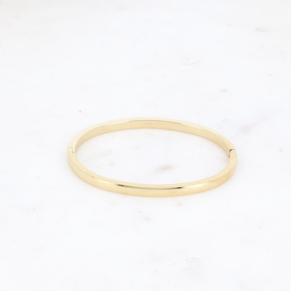 goudkleurige platte hoekige bangle van stainless steel