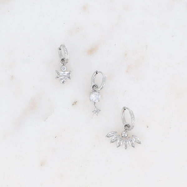 zilverkleurige set van 3 oorbellen met witte steentjes stainless steel