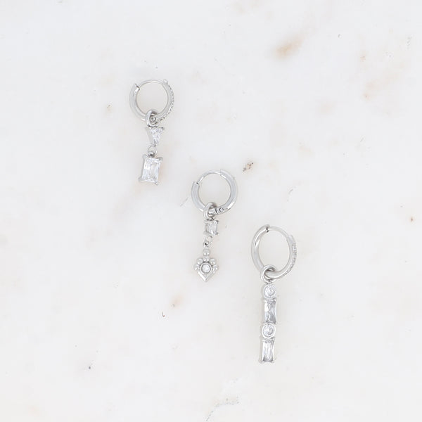 zilverkleurige set van 3 oorbellen met witte steentjes stainless steel