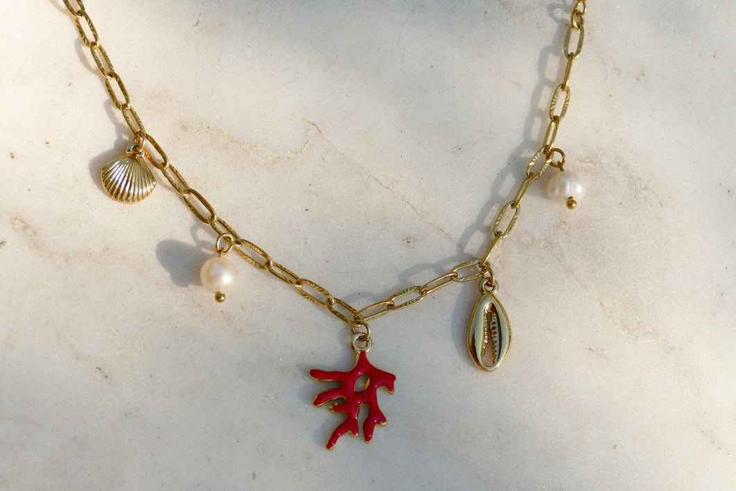goudkleurige armband met grote bedels 🐚 stainless steel