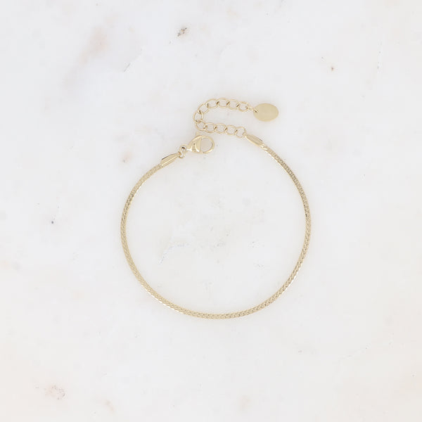 fijn smal goudkleurig slangenarmbandje van stainless steel