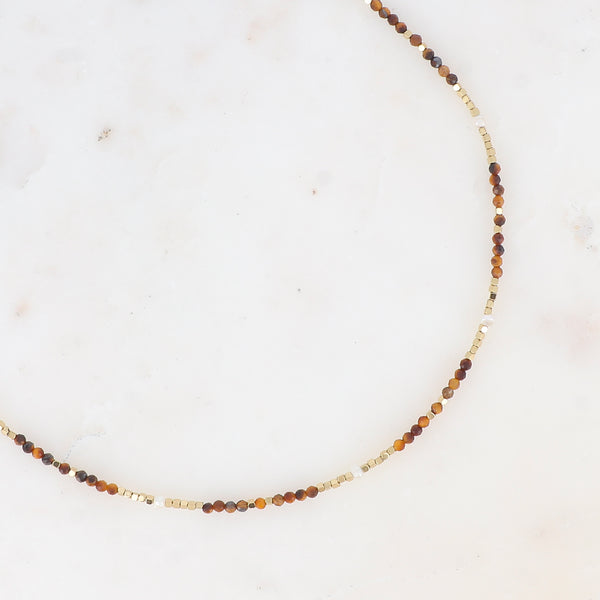 collier met bruine mineralen en stainless steel