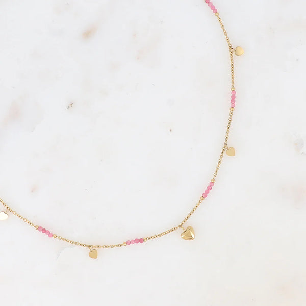 goudkleurig fijn kettinkje met hartje en roze steentjes | stainless steel