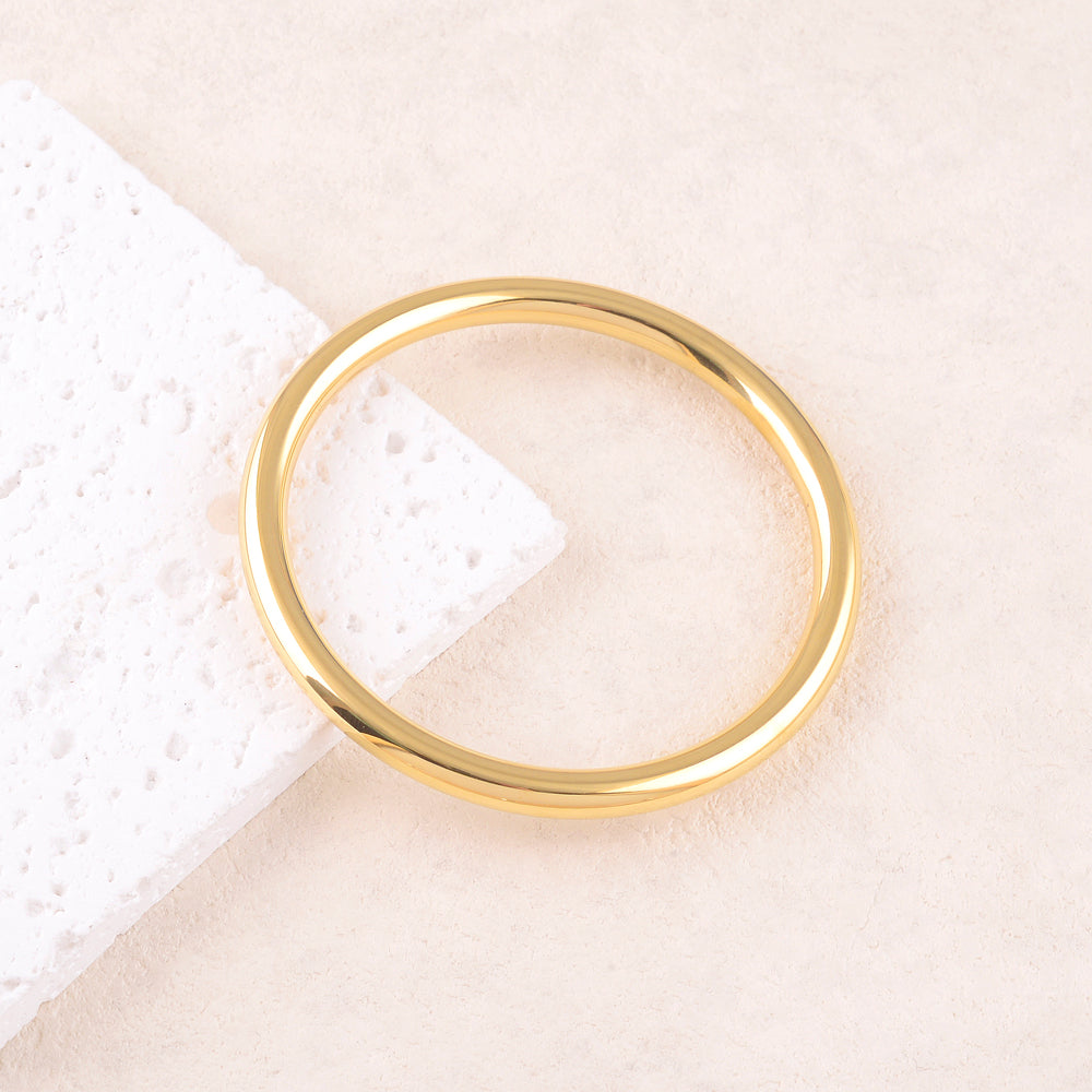 goudkleurige brede bangle stainless steel