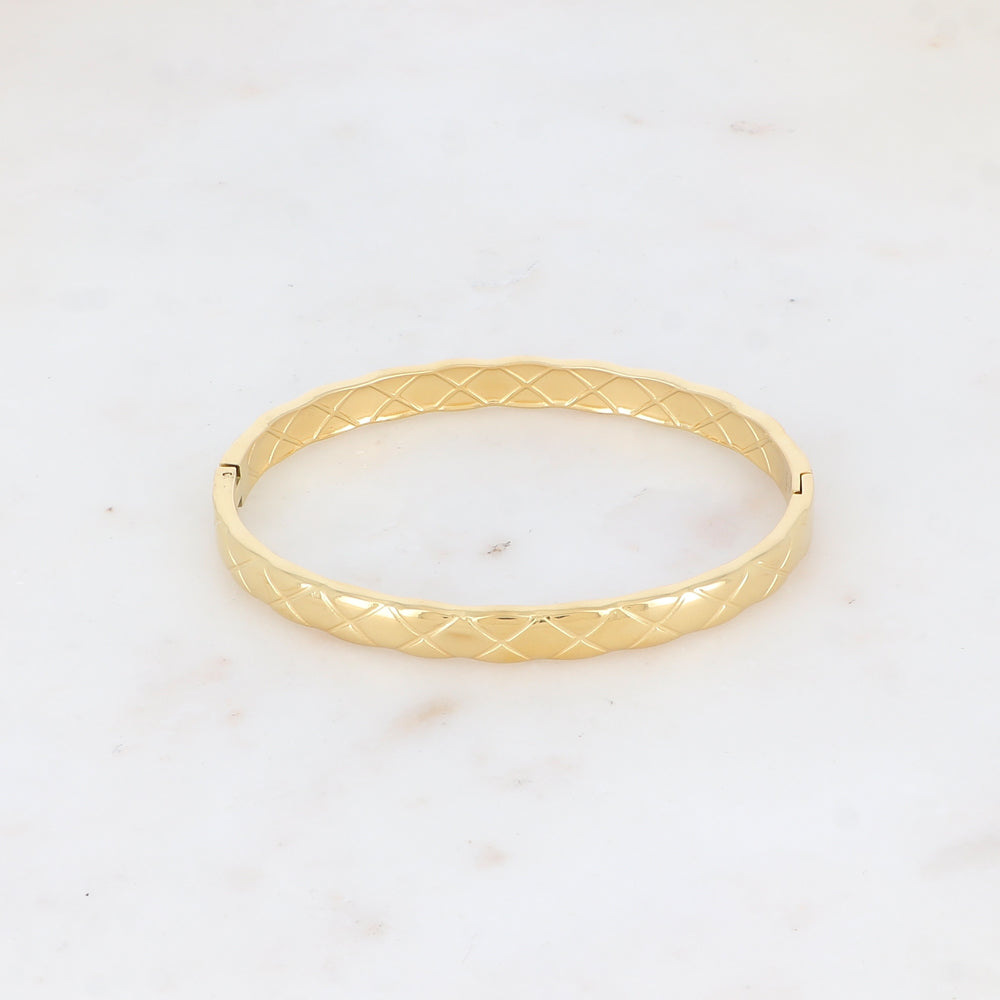 goudkleurige brede bangle met patroon stainless steel