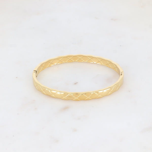 goudkleurige brede bangle met patroon stainless steel