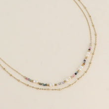 Afbeelding in Gallery-weergave laden, goudkleurig dubbel collier met mineralen, pareltjes en goudkleurige accenten
