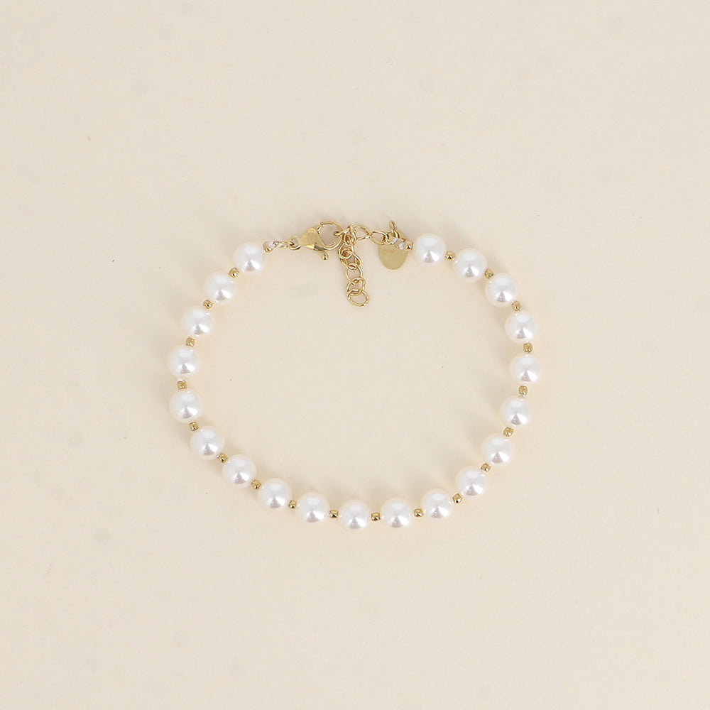 armband van witte parels met goudkleurige bolletjes