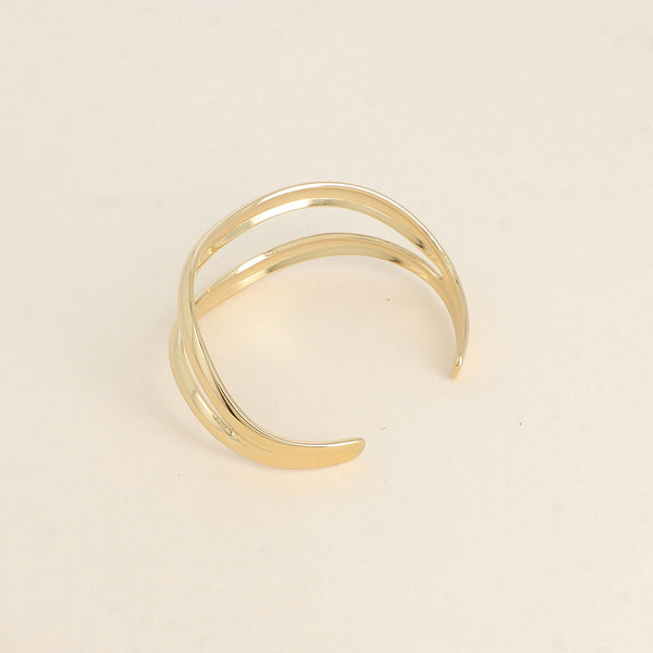 goudkleurige cuff van stainless steel
