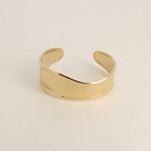 goudkleurige cuff van stainless steel
