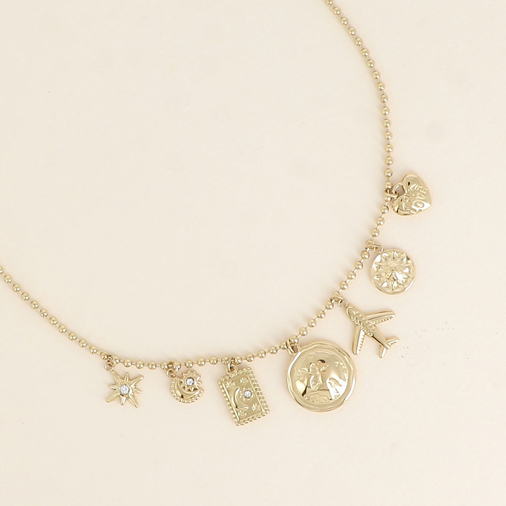 goudkleurige collier stainless steel met reis bedels