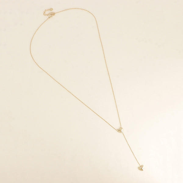 fijn goudkleurig Y collier stainless steel met dichte hartjes