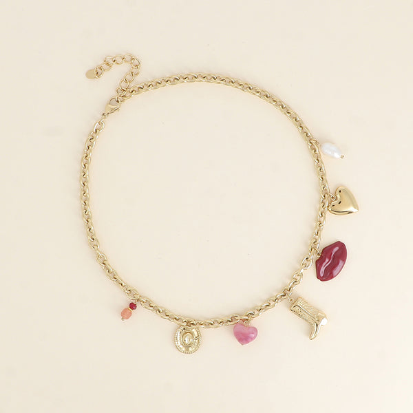 goudkleurig schakel collier met statement bedels 💗 | stainless steel