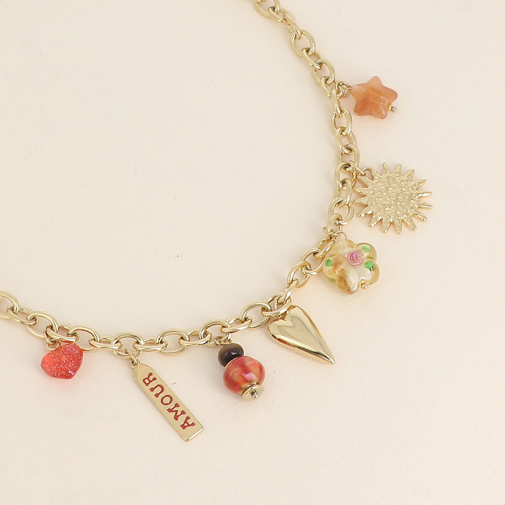 goudkleurig schakel collier met statement bedels 💗 | stainless steel