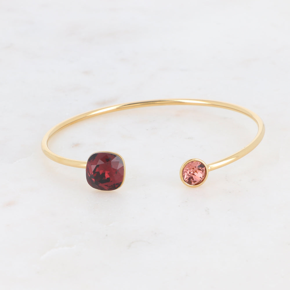 goudkleurige bangle met oud roze en bordeaux gekleurde stenen | stainless steel