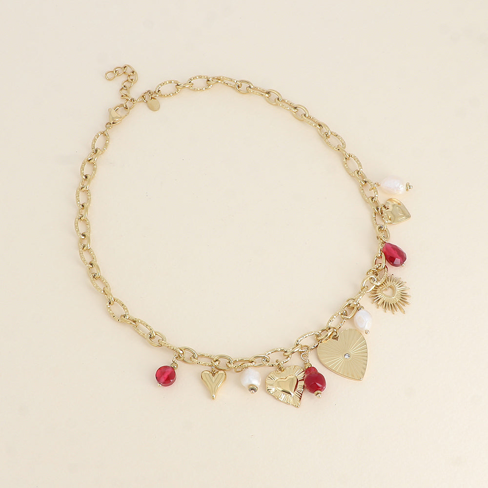 goudkleurig schakel collier met rode bedels stainless steel