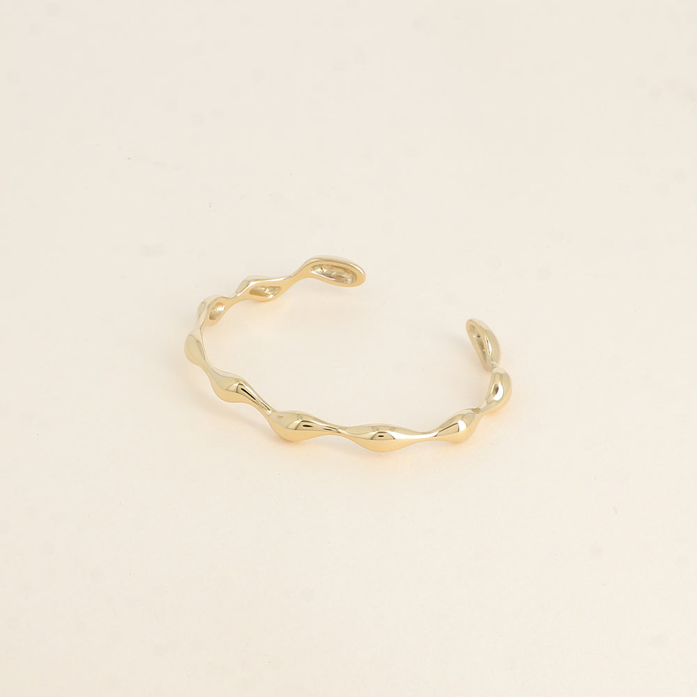 goudkleurige cuff van stainless steel