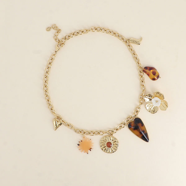 goudkleurig schakel collier met statement bedels 🤎 | stainless steel