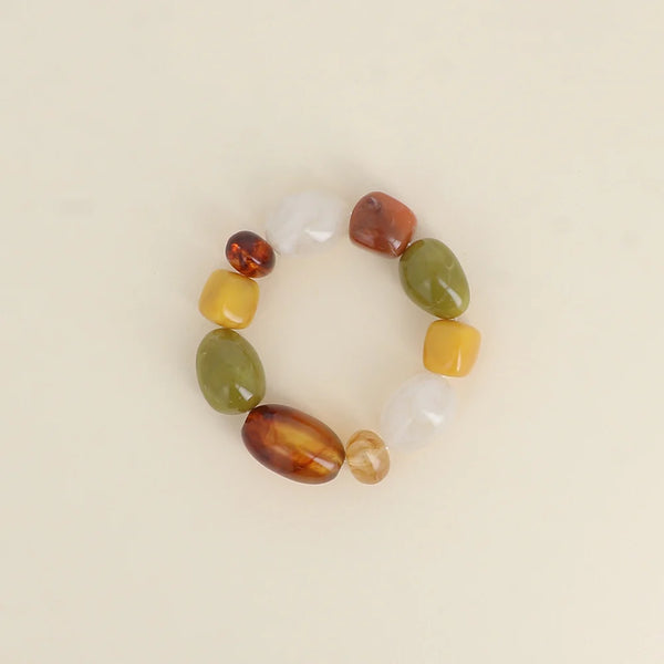 statement kralen armband van resin in herfst tinten