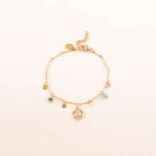 Afbeelding in Gallery-weergave laden, goudkleurige armband met muntje en turkoois accenten | stainless steel
