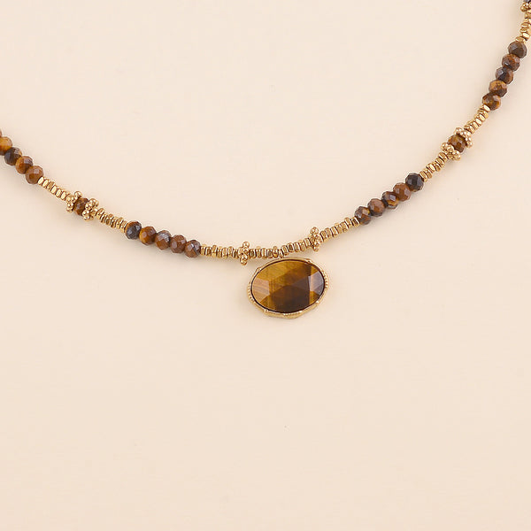 collier van bruine kralen met goudkleurige accenten | stainless steel