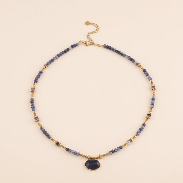 collier van donkerblauwe kralen met goudkleurige accenten | stainless steel