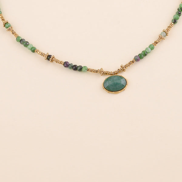 collier van donker groene kralen met goudkleurige accenten | stainless steel