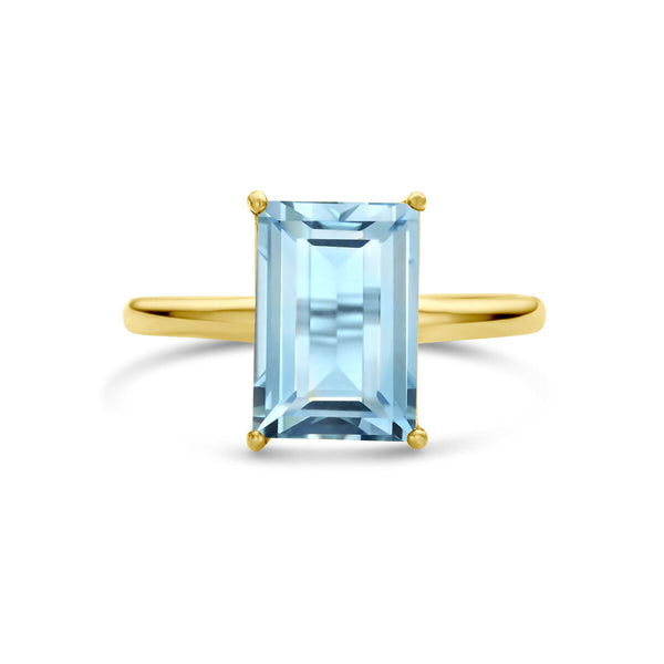 echt gouden ring met grote baguette geslepen blauwe topaas | 14 krt