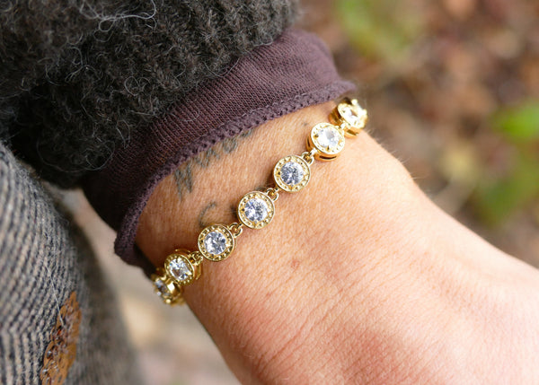 goudkleurige tennisbracelet met zirkonia stenen | stainless steel