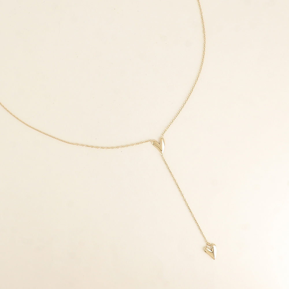 fijn goudkleurig Y collier met dichte hartjes 💗 stainless steel