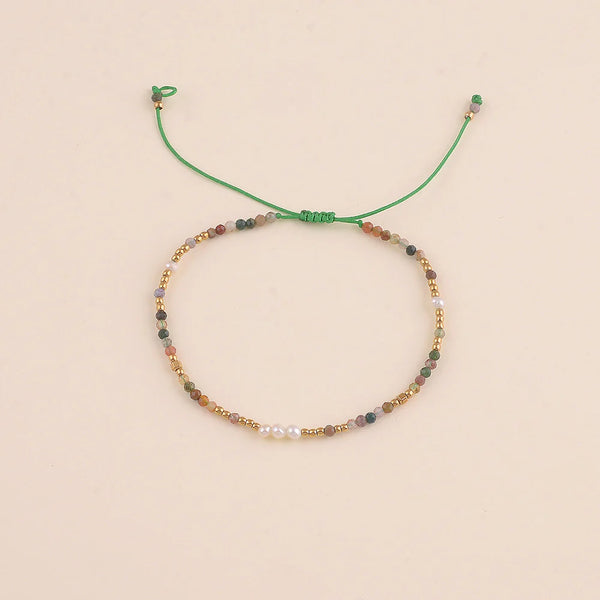 armband van agaath in groene tinten met witte parels