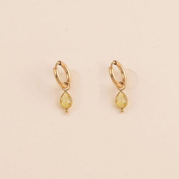 goudkleurige oorringen met ovale steentjes | okergeel 💛
