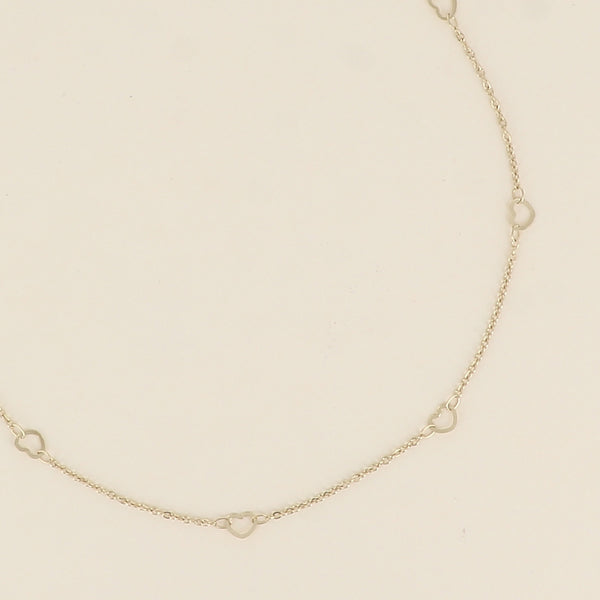 fijn goudkleurig collier met open hartjes | stainless steel