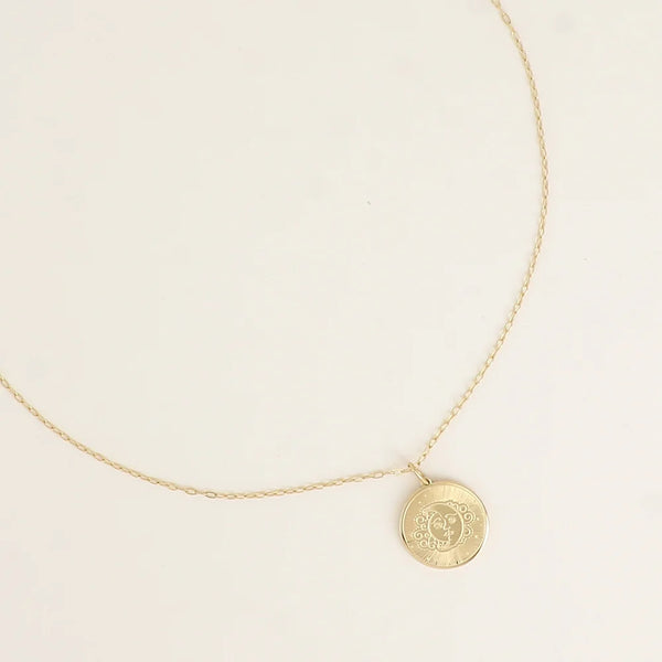 goudkleurig fijn collier met zon maan muntje 🌙 | stainless steel