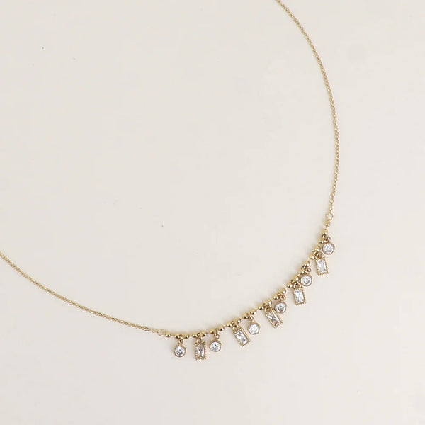 pre order! fijn goudkleurig collier met transparante stenen en bolletjes | stainless steel